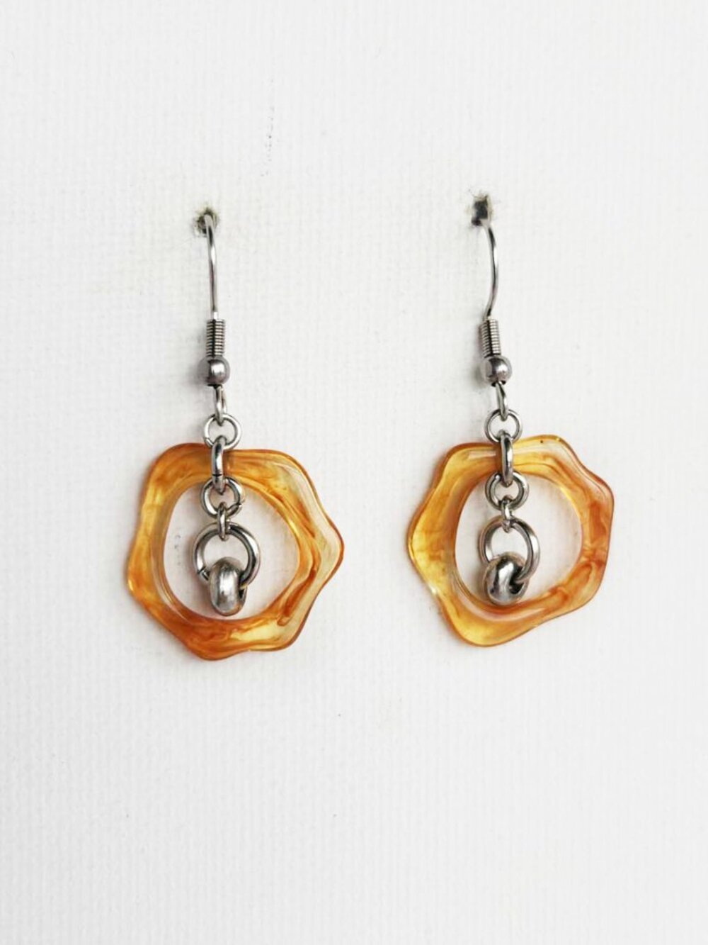 Silver and amber asymmetrical hoop earrings